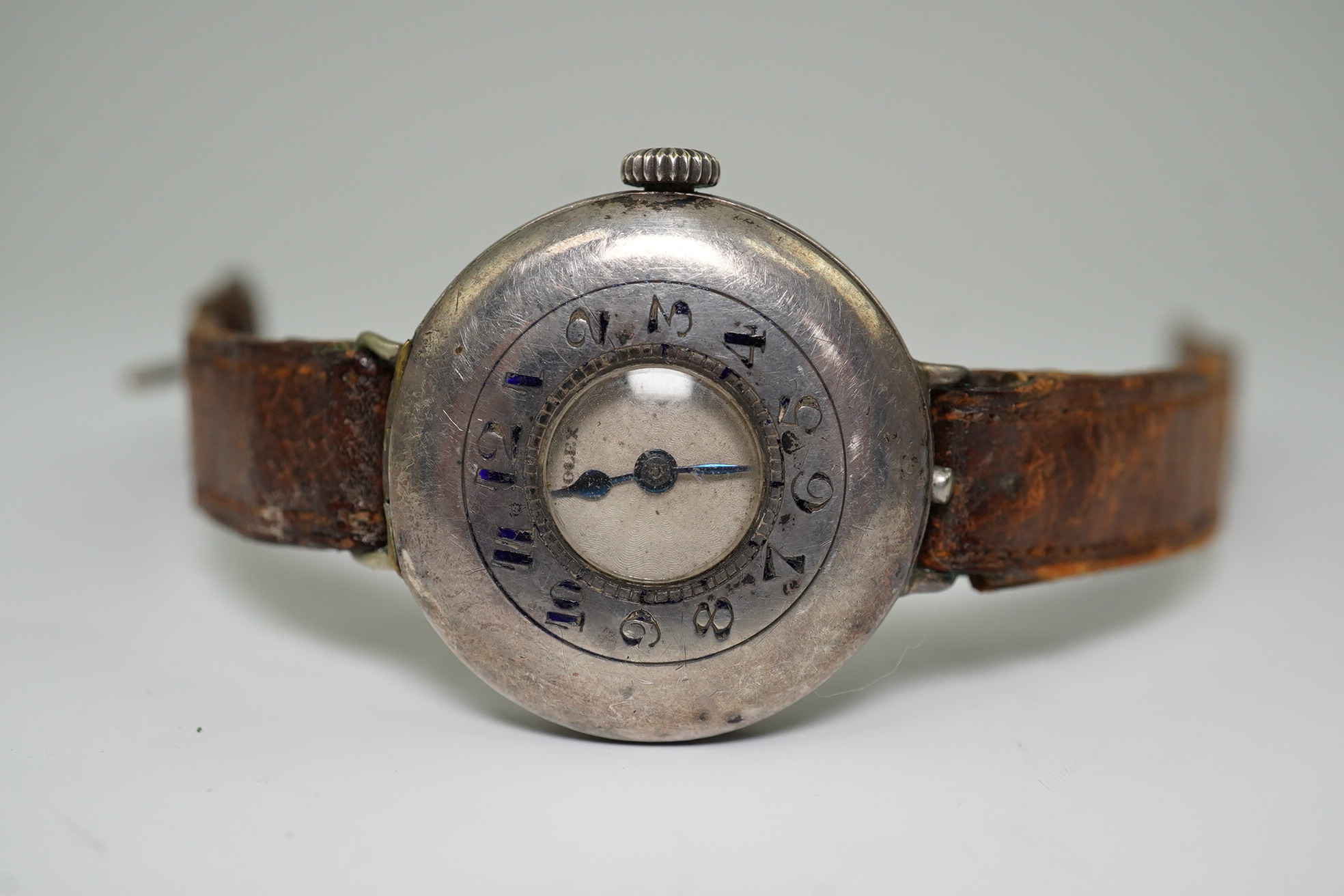 A gentleman's mid 1920's silver Rolex half hunter manual wind wrist watch